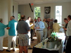 Guests enjoy complimentary cocktails.